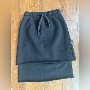 Nununu black layered drawstring sweatshirt skirt. Unworn. Size 6-7